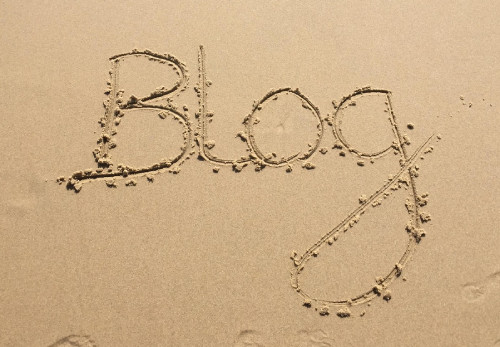 Blog written in beach sand Blog written in beach sand