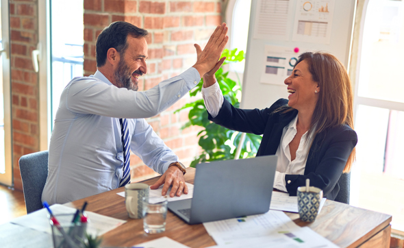 man and woman celebrate