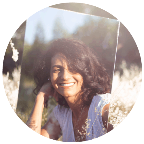 Woman reflecting circular image